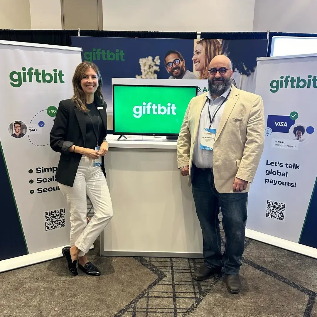 Matt and Sofia at trade show booth