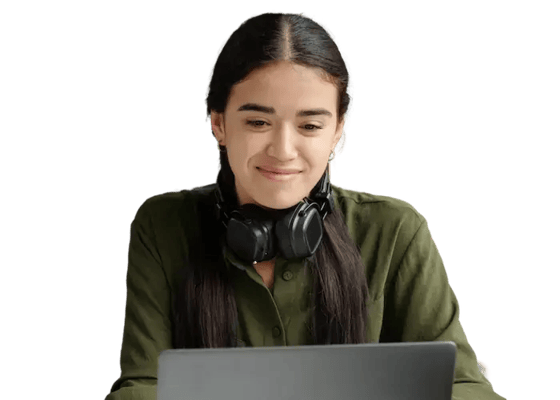 Researcher with headphones at laptop.