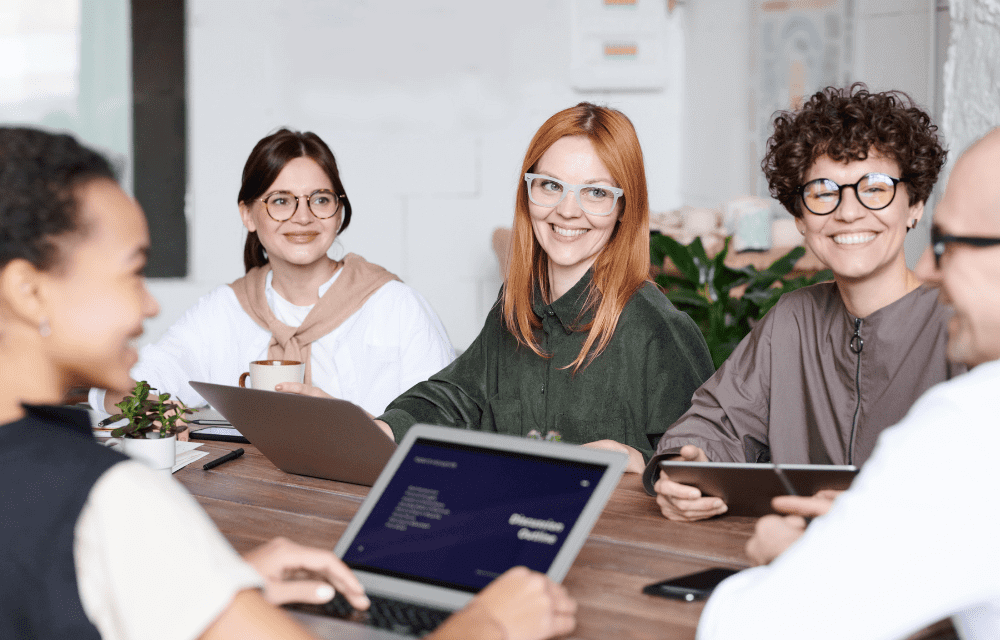 Group of people happy to receive Amazon gift cards. 