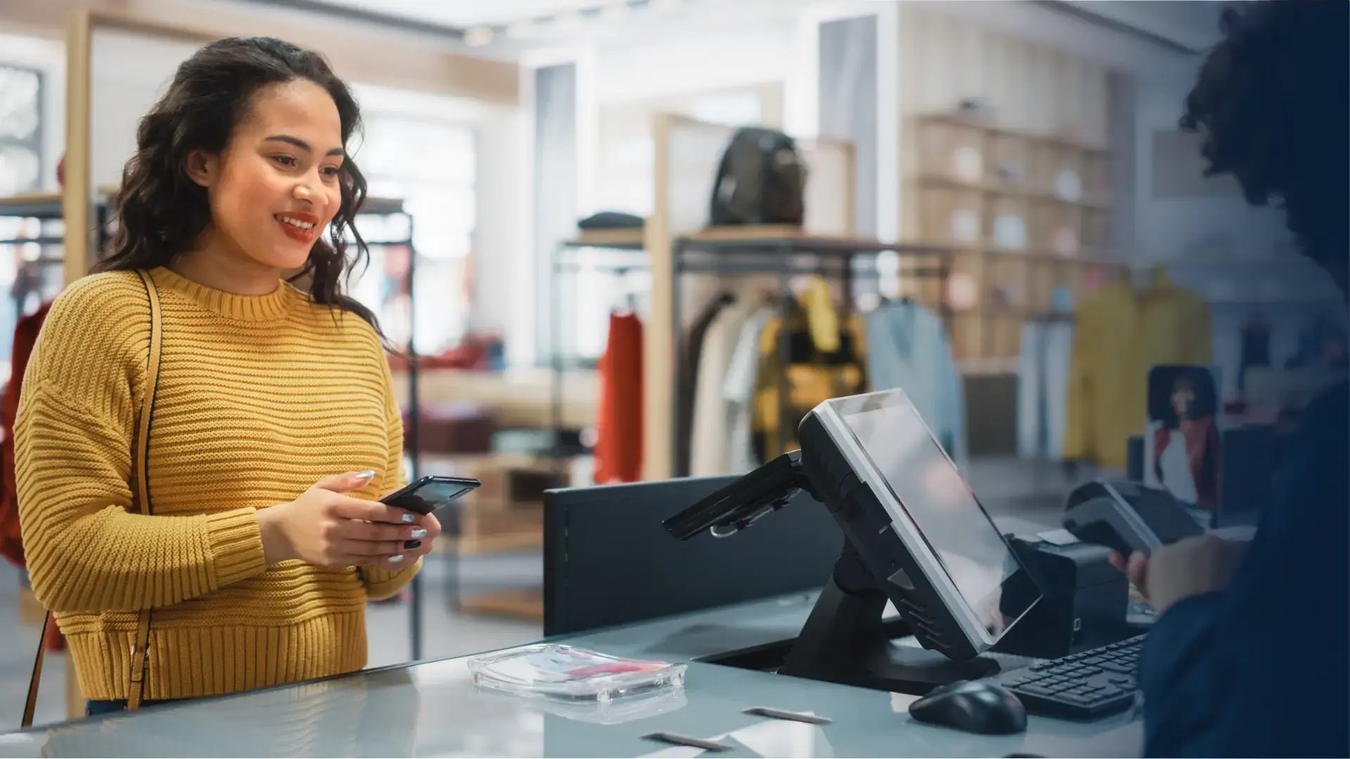 Happy recipient paying with gift card on mobile wallet.